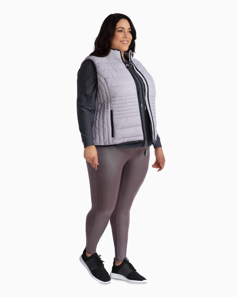 Plus size model with rectangle body shape wearing Juniper Packable Puffer Vest by Marc NY | Dia&Co | dia_product_style_image_id:112685